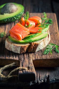 Spring sandwich with avocadoa, salmon and dill
