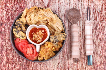 Deep fried dessert of corn ,taro ,nian gao and banana .
