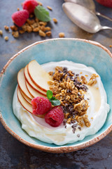 Yogurt bowl with raspberry and granola