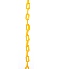 New yellow plastic chain. Studio shot isolated on white
