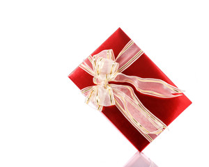 New color gift box with ribbon. Studio shot isolated on white