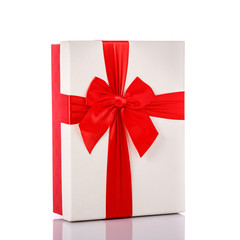 New color gift box with ribbon. Studio shot isolated on white