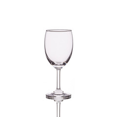 Empty clear wine glass. Studio shot isolated on white