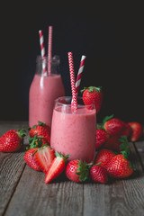 chill and relax time with strawberry smoothie with wood backgrou