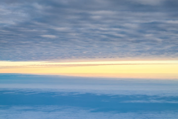 View sunset with sky and cloudy from airplane window when flying