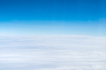Naklejka na ściany i meble Blue sky and Cloud Top view from airplane window,Nature backgrou
