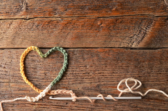 Crochet Yarn, Hook, and Heart Symbol