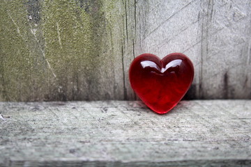 Red Glass Heart on Aged Timber