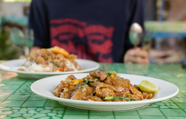 Thai street food,Fried noodle with pork on dish