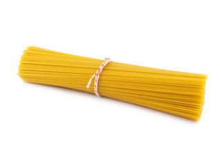 Bunch of gold spaghetti on white background