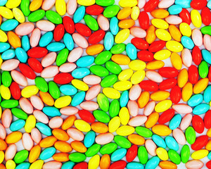 Fototapeta na wymiar Multicolored candies for use as background. Closeup.