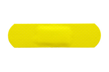 beige fabric adhesive plasters isolated on white background