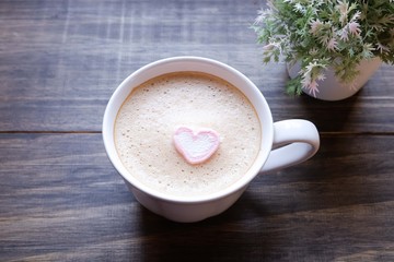 hot cappuccino with marshmallow heart shape