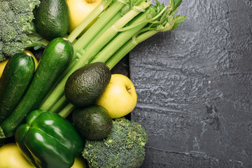 Healthy green vegetables background with copy space