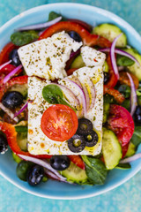 Choriatiki - Greek salad with feta cheese. Mediterranean food.
