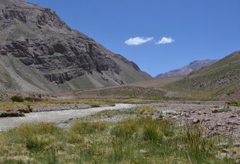 Small river flowing through a dry landscape near Aconcagua Argentina.