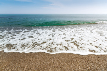 calm waves at the beach / hot summer day photo Crimea