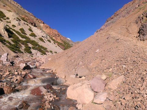 Dusty trail following this stream on the Polish Glacier Circuit trail heading up to base camp.