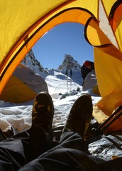 Peering out of the tent at high camp in the Andes of Argentina.  © mat_millard