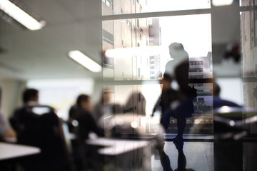 Abstract business women Silhouette and light looking to the future and team