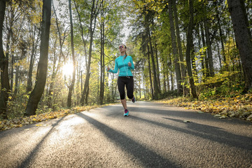 Fototapeta premium Runner in action at autumn.