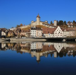 Fototapeta na wymiar Medieval castle Munot and other old buildings mirroring in the river Rhine