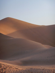 Fototapeta na wymiar Wüste im Oman zum Sonnenuntergang