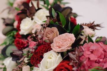 Wedding dicorating bouquet of roses and petals, closeup