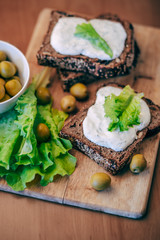 Healthy and Vegetarian diet breakfast concept. Homemade bread with cheese cream