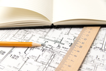 On the sheet of the drawing is a pencil with Notepad