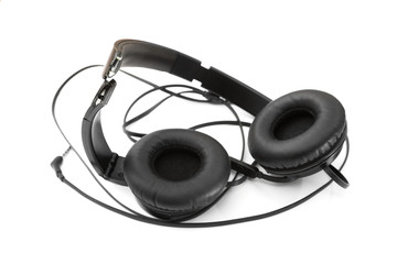 Broken headphones on white isolated background