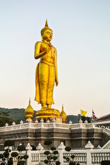 Fototapeta na wymiar Phra Buddha Mongkol Maharaj standing Buddha in HatYai Songkla province Thailand