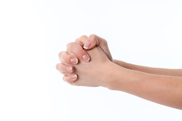 two hands with palms facing each other, pressed fist close-up