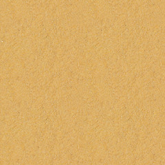 Fototapeta na wymiar Seamless yellow sand flat surface texture.