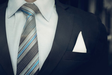 Portrait of smart business man close up wearing formal suit and
