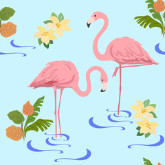 Seamless pattern with a pair of flamingos and tropical plants on a blue background.
