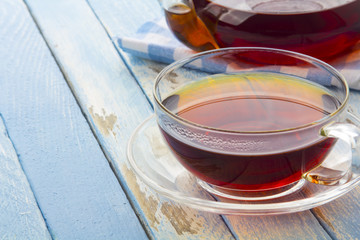 tea kettle cup vintage wood background
