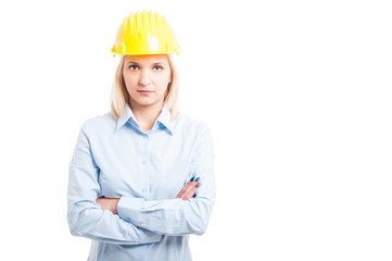 Portrait female engineer posing with arms crossed