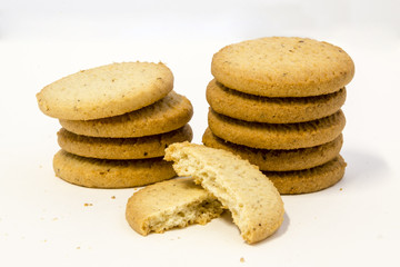 Stacked sweet cookies isolated on white background