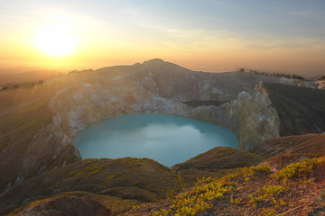 Kelimutu crater at sunrise -  volcano, close to the town of Moni in central Flores island in Indonesia © robnaw