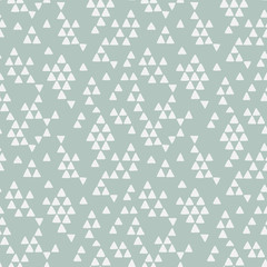 Seamless hand drawn geometric tribal pattern with triangles. Vector navajo design.