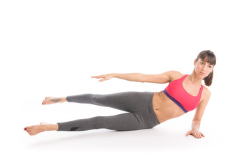 Obraz premium Portrait of attractive woman doing yoga, pilates. Healthy lifestyle and sports concept. Series of exercise poses. Isolated on white.