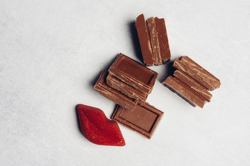 pieces of chocolate and red lips