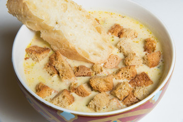 Bowl of soup with croutons