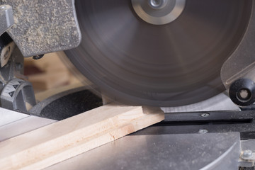 Carpenter tools on wooden table with sawdust. Circular Saw.