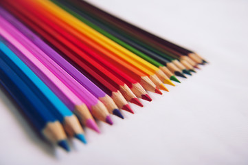 Colored pencils isolated on white background