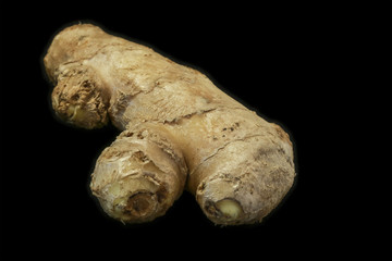 Ginger root isolated on black background