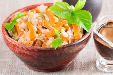 Vintage wooden bowl with cooked rice