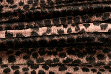 Brown and black leopard pattern.