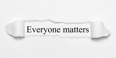 Everyone matters on white torn paper